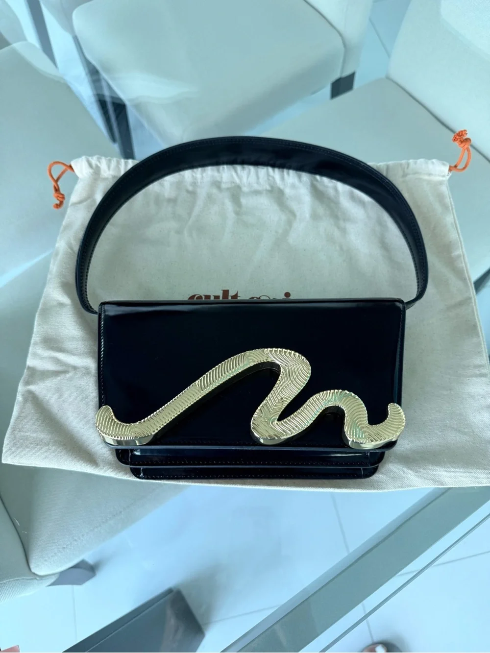 Cult Gaia Black Patent Shoulder Bag with Gold Snake Accent